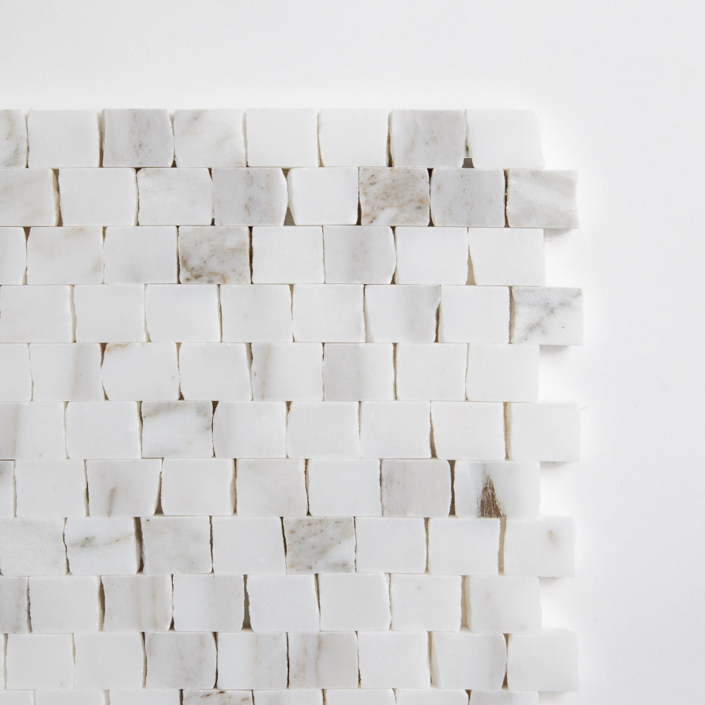 Marble Systems Broken Joint Mosaic Calacatta Gold Royal matte marble tile close-up view — available at Surface Group