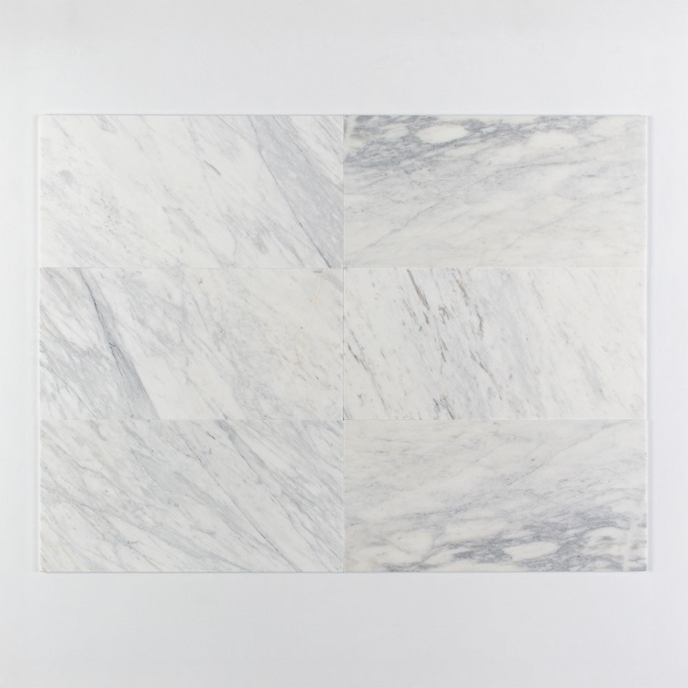 Marble Systems Calacatta Gold Royal Honed Marble Calacatta Gold Royal matte tile pattern swatch — available at Surface Group