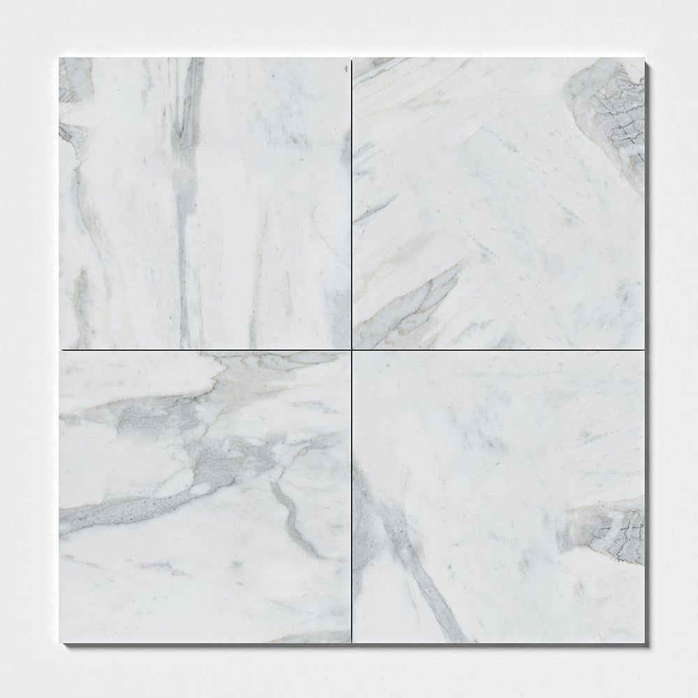 Marble Systems Calacatta Gold Royal Honed Marble Calacatta Gold Royal matte tile pattern swatch — available at Surface Group