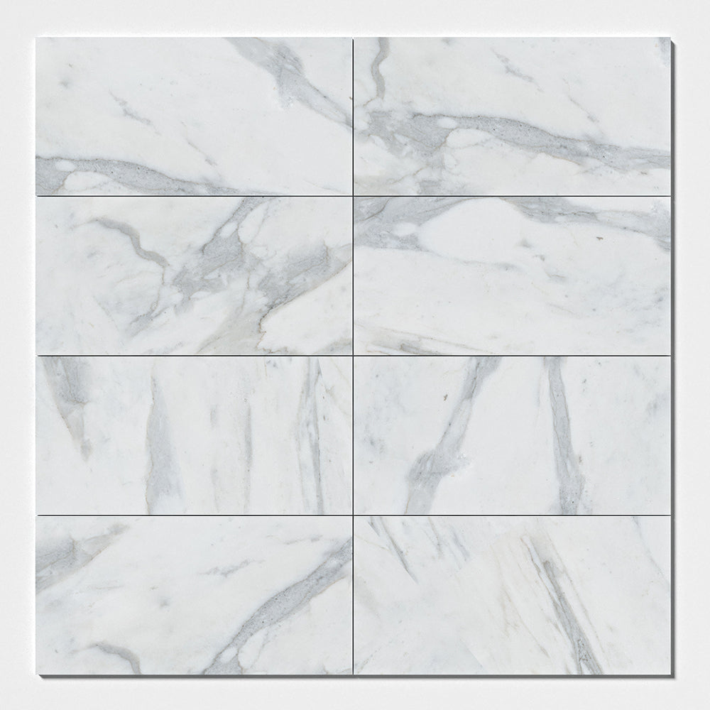 Marble Systems Calacatta Gold Royal Honed Marble Calacatta Gold Royal matte tile pattern swatch — available at Surface Group