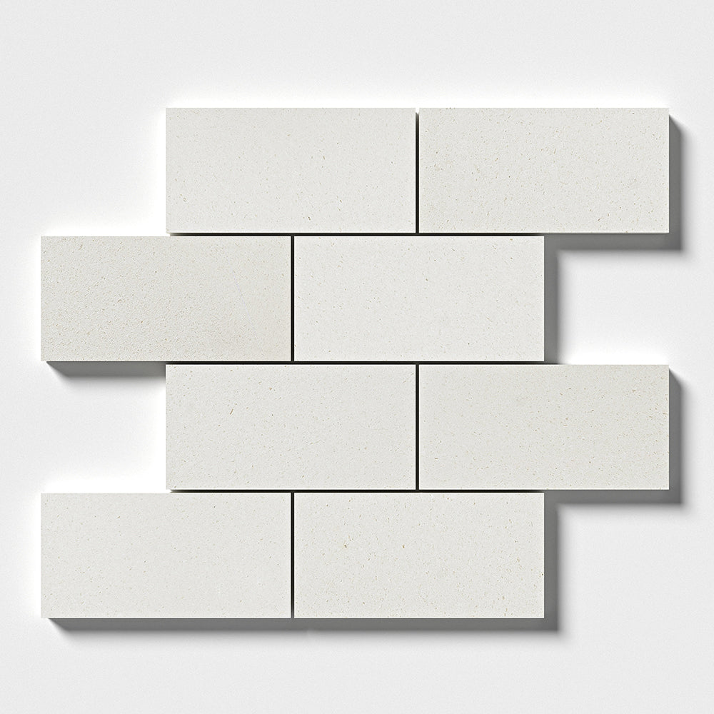 Marble Systems Champagne Limestone Tiles Champagne matte limestone tile pattern swatch — available at Surface Group