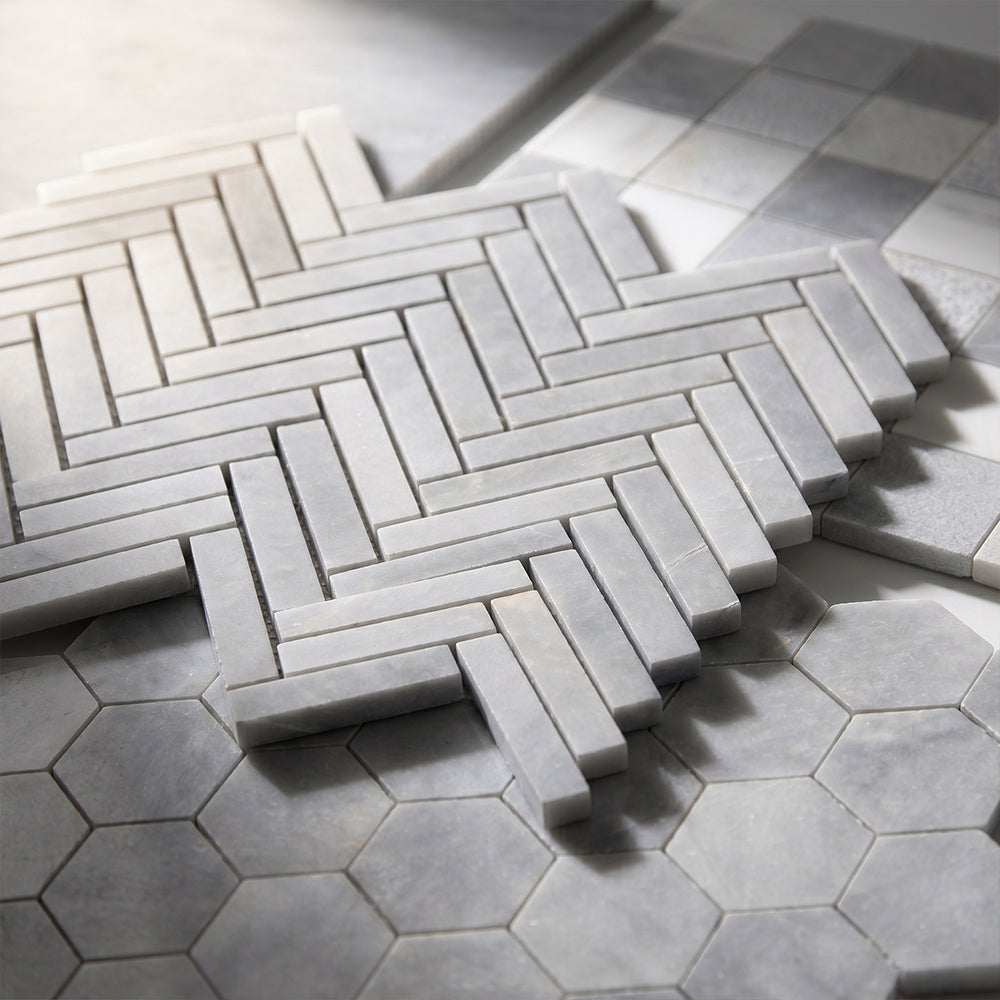 Allure Light, Snow White, Glacier Honed 2×2 Marble Mosaics 12×12 (MS01714) Allure Light Honed Hexagon Marble Mosaics 10 3/8×12 (MS02039) Allure Light Honed Herringbone 5/8×3 Marble Mosaics 10 7/16×12 13/16 (MS02038)