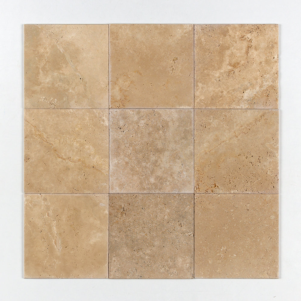 Marble Systems Ivory Travertine Ivory rugged travertine tile pattern swatch — available at Surface Group
