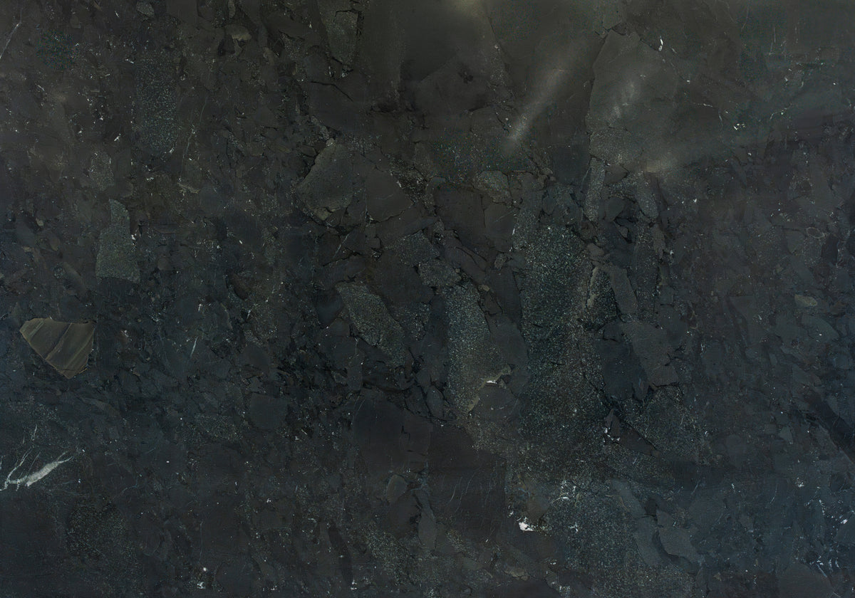 Marble Systems Quartzite Slabs Black glossy quartzite tile — available at Surface Group