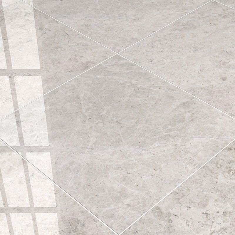 Marble Systems Silver Clouds Marble Silver Clouds glossy marble tile arrangement — available at Surface Group
