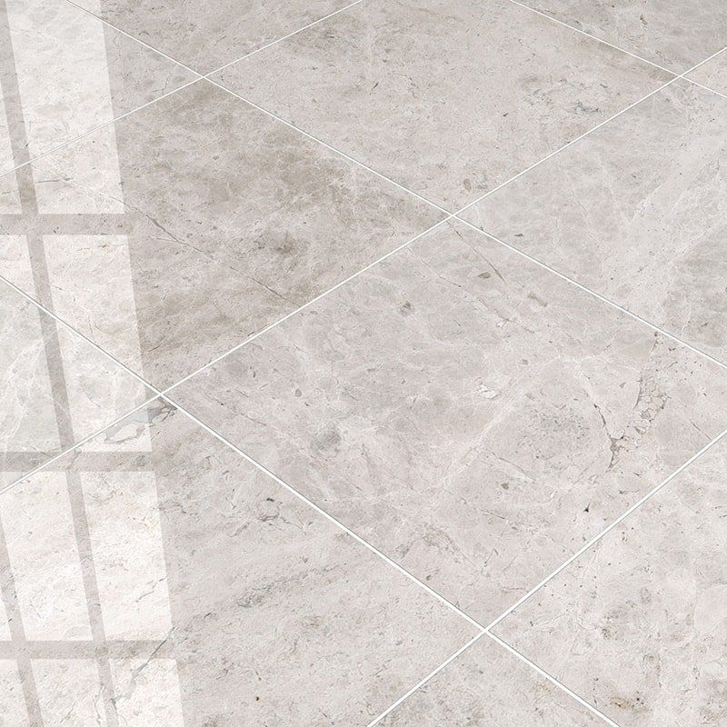 Marble Systems Silver Clouds Marble Silver Clouds glossy marble tile arrangement — available at Surface Group