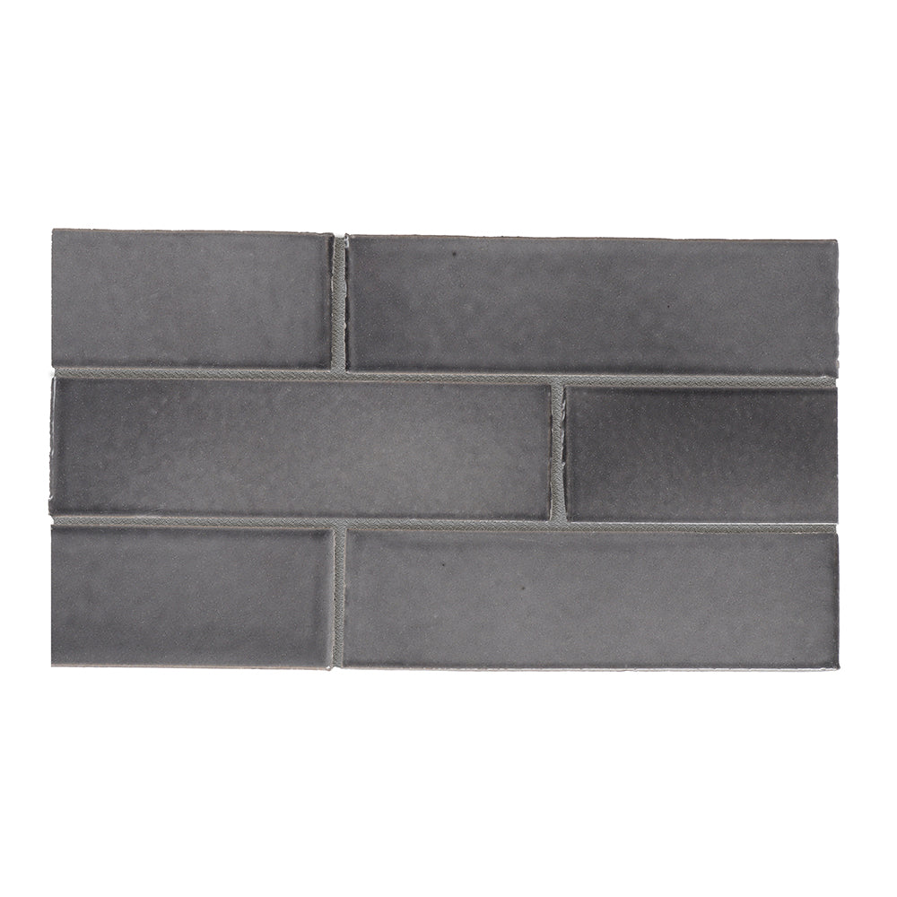 Marble Systems Temple Brick Glazed Tile Fedora Gray glossy brick tile sample board — available at Surface Group