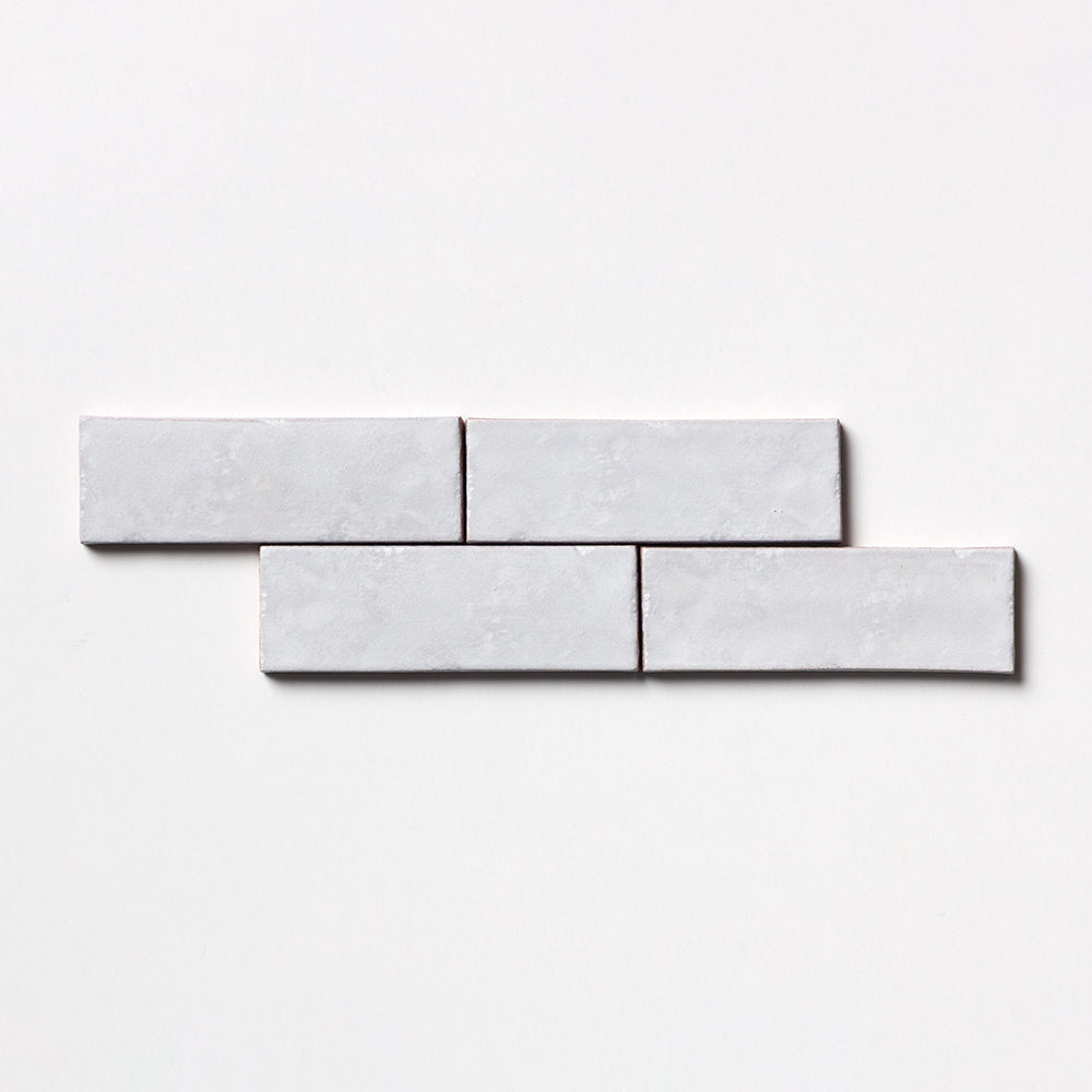 Marble Systems Traces Milos matte terracotta tile pattern swatch — available at Surface Group