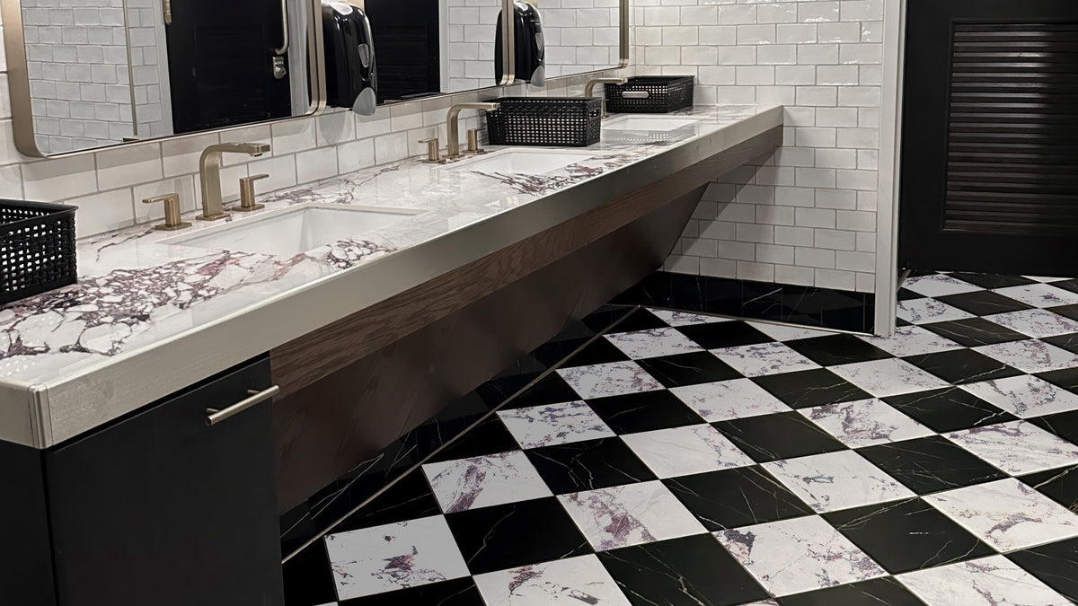 Nsr Calacatta Viola & Negro Marquina Checkerboard tile in a room setting — available at Surface Group