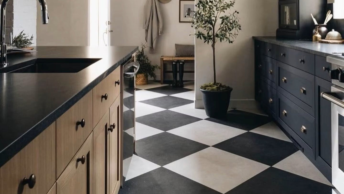 Nsr Crema Europa & Absolute Black Checkerboard tile in a room setting — available at Surface Group
