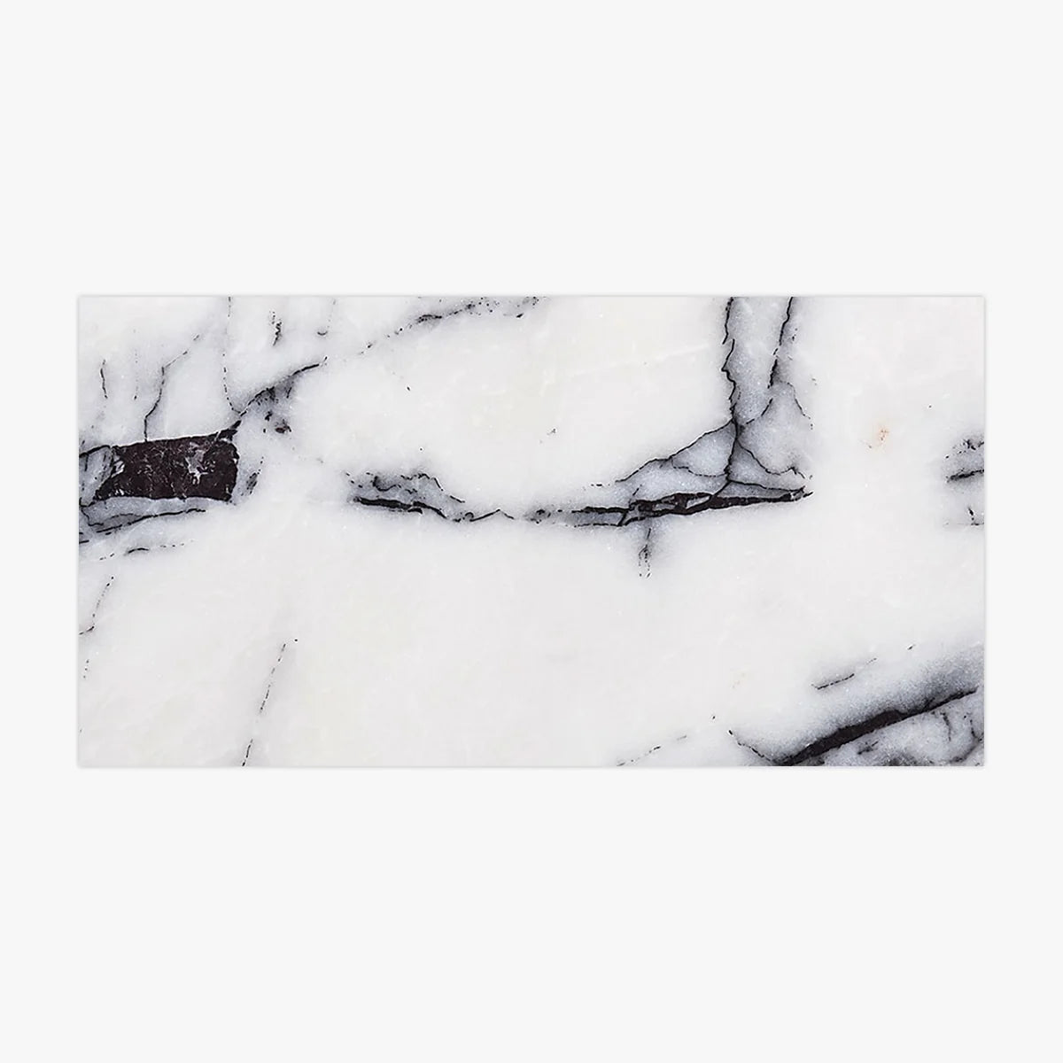 Essentials Natural Stone White field tile, primary product image. Premium marble for floors and walls.