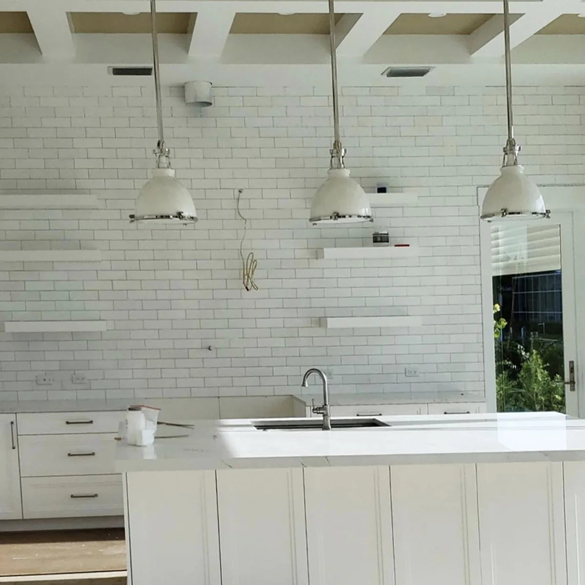 Thassos White Polished Marble White field tile, lifestyle installation view. Premium marble for floors and walls.