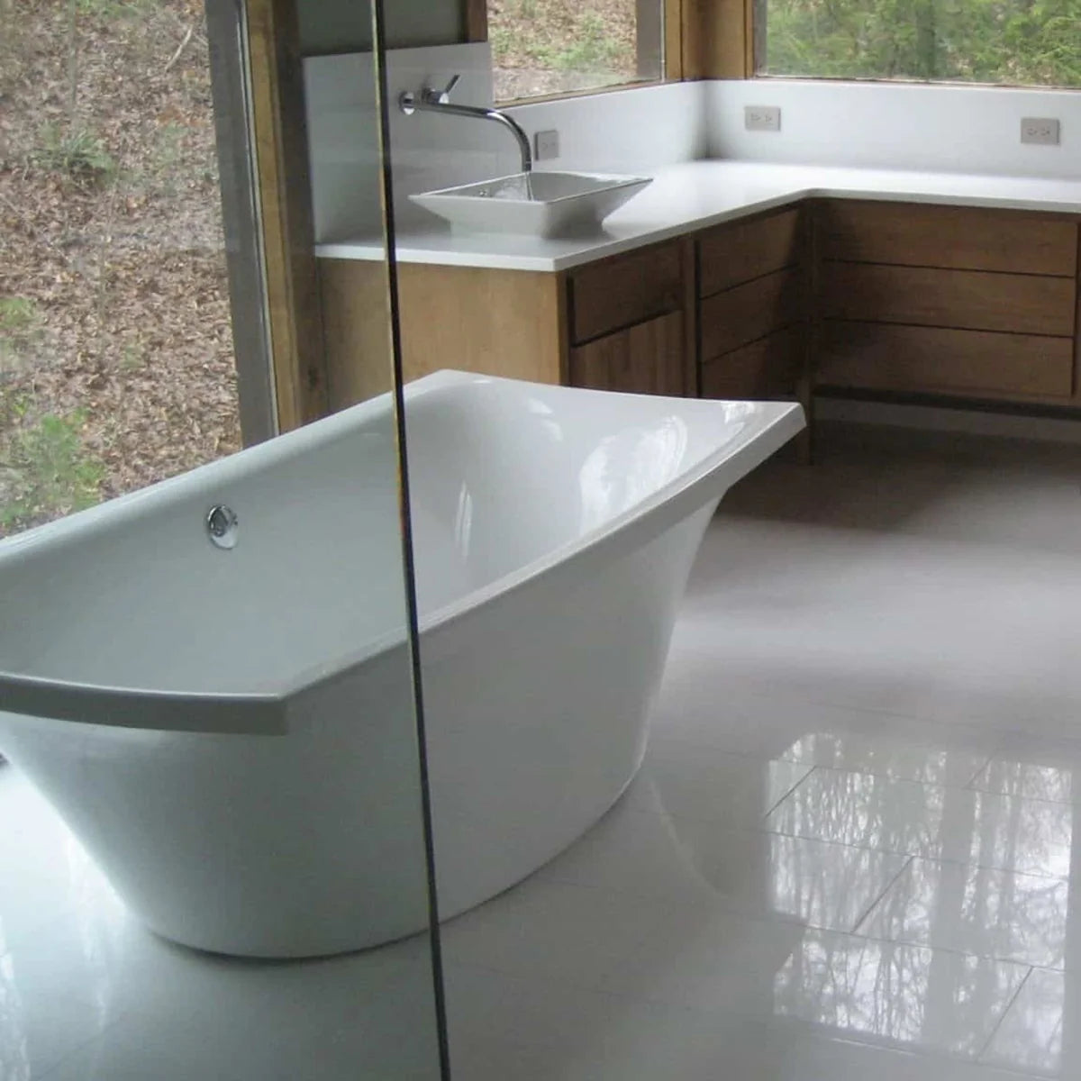 Essentials Natural Stone White field tile, lifestyle installation view. Premium marble for floors and walls.