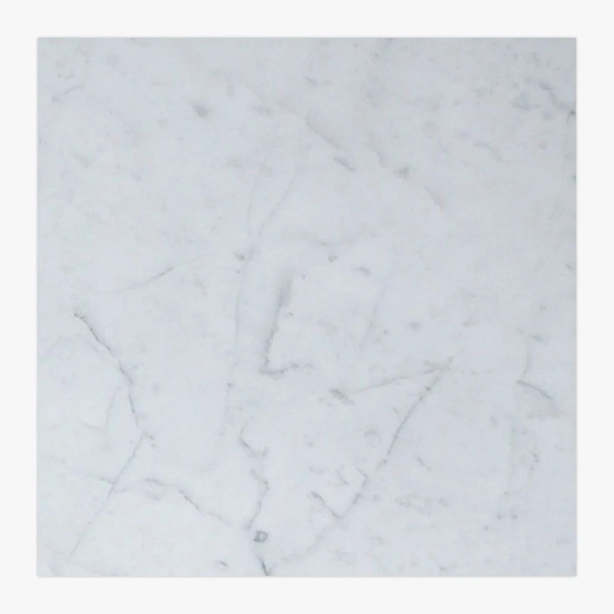 Essentials Natural Stone White field tile, primary product image. Premium marble for floors and walls.