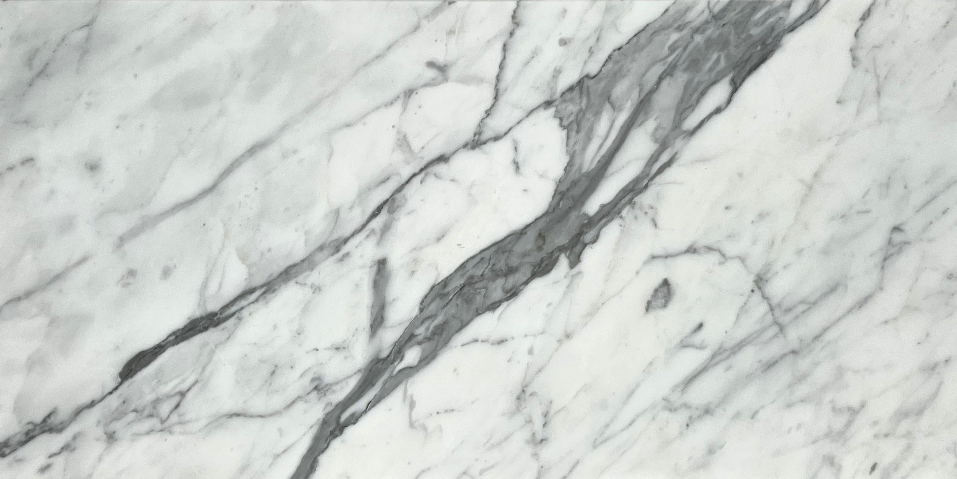 WORLD STONE: Statuary Marble Field Tile (12"X24"X⅜" | Honed)